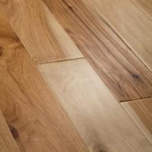 Close-up photo of Hickory hardwood flooring.