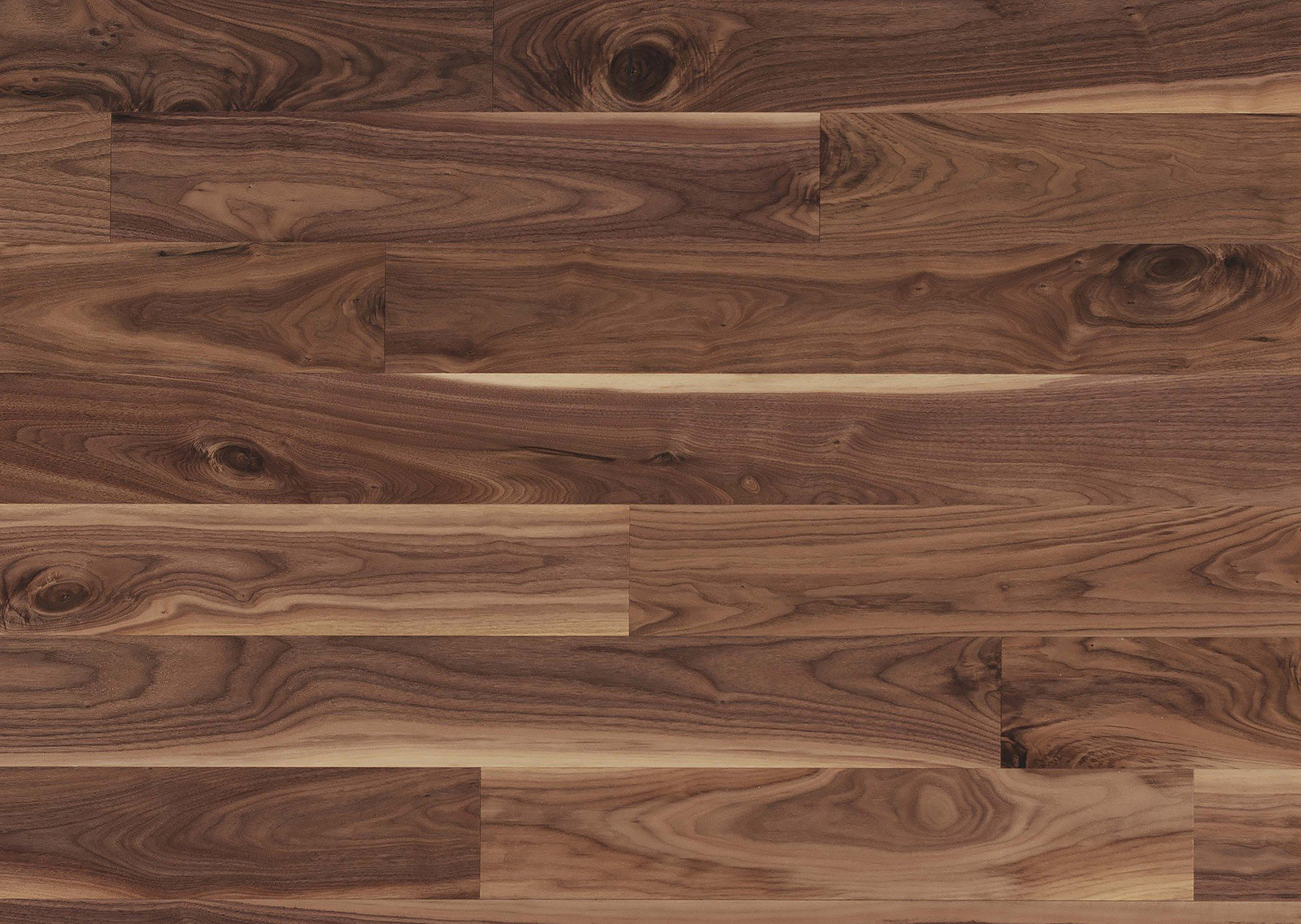 Close-up photo of walnut hardwood flooring planks. 